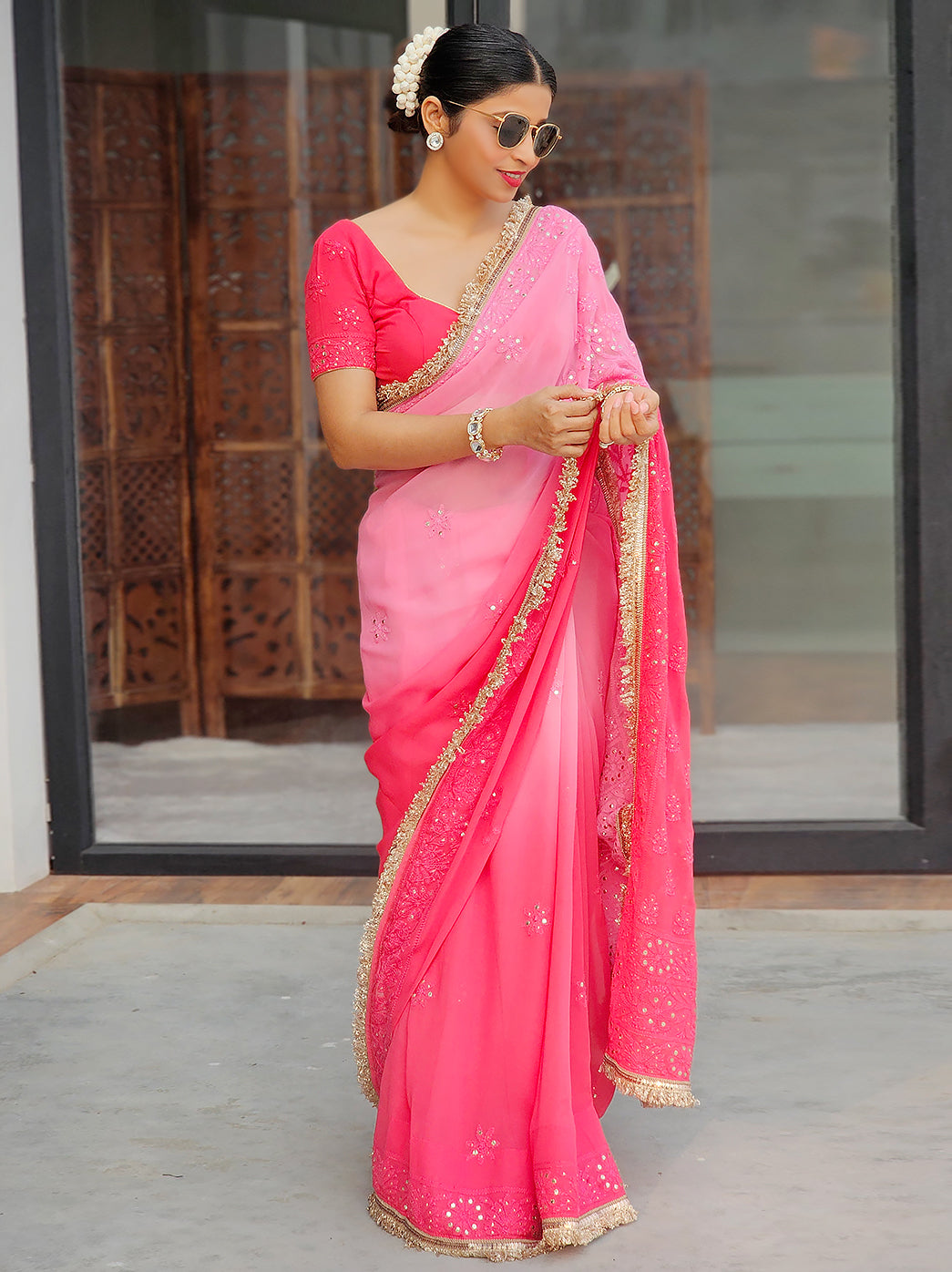 Luxury saree crafted in soft viscose fabric with intricate mukaish embellishments for premium festive occasions.