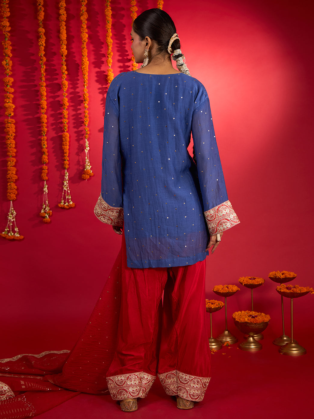 Noorani blue Mul Chanderi Chikankari short kurti with red Farshi bottoms and dupatta