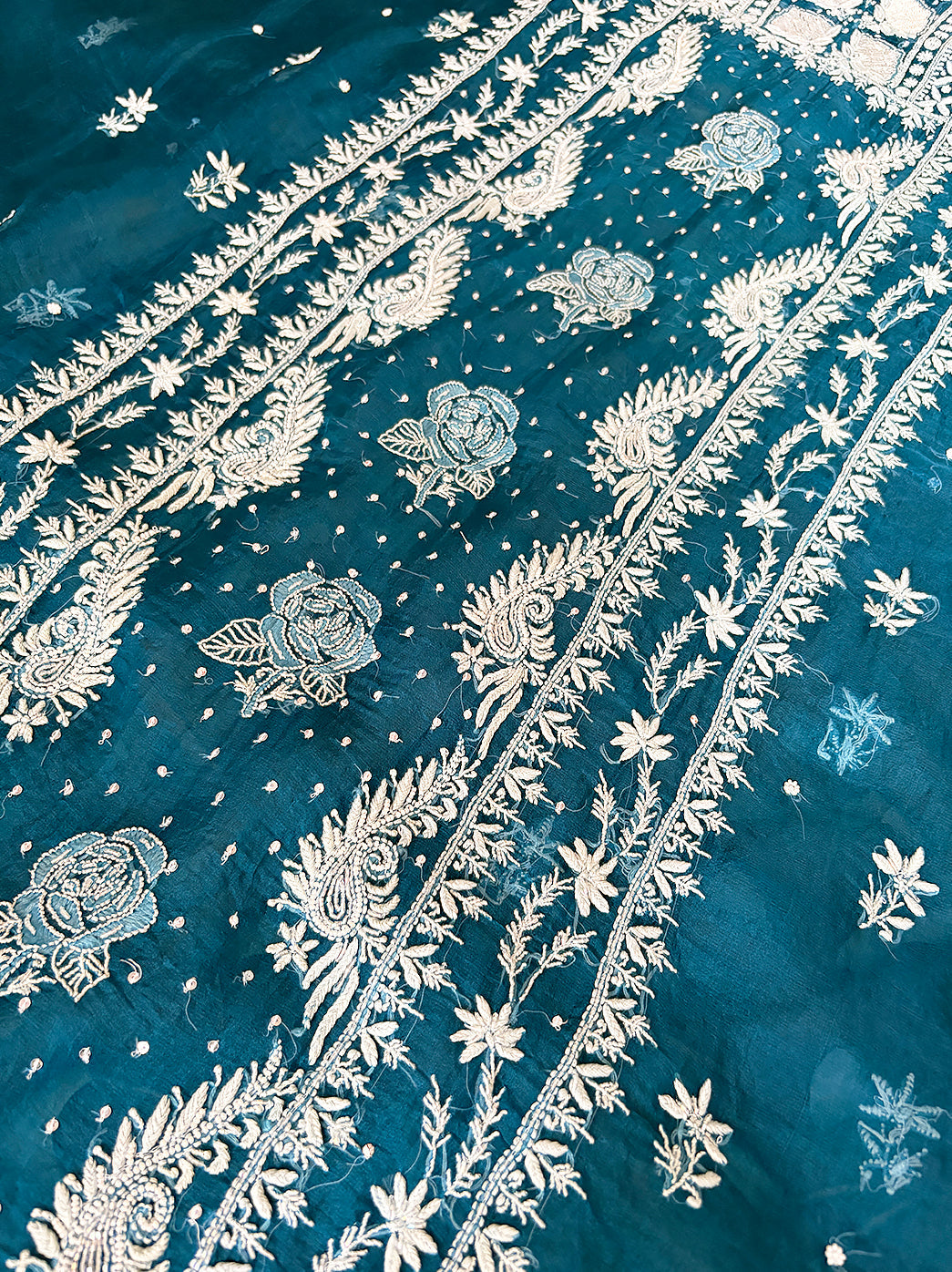 Designer organza kurti piece featuring detailed chikankari hand embroidery and coordinating dupatta.