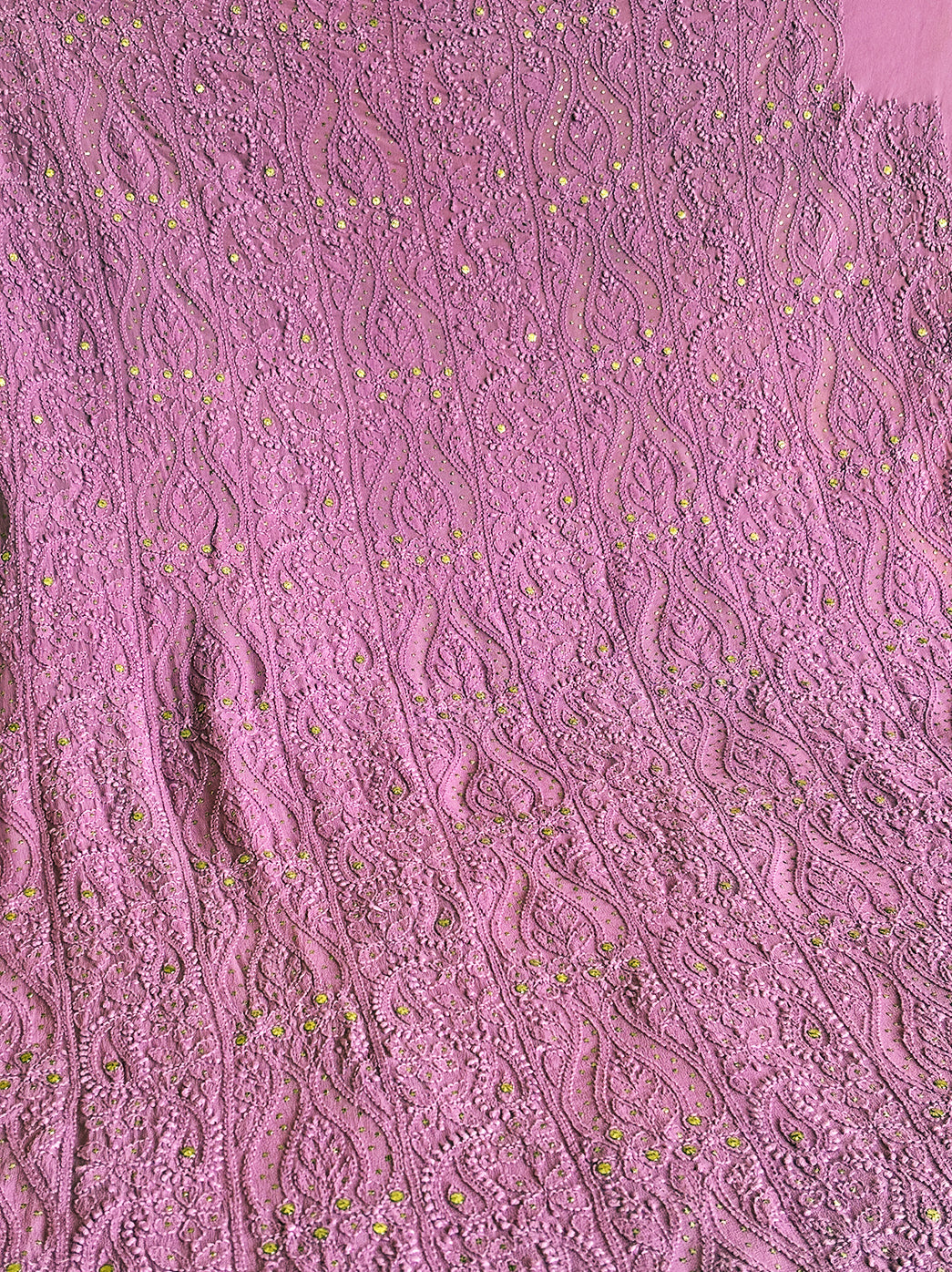 “Close-up of delicate chikankari hand embroidery with mirror embellishments on viscose kurti piece with dupatta”