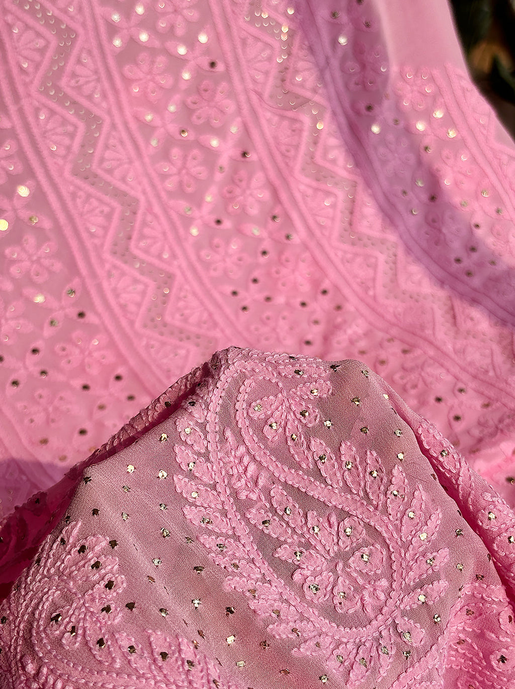Close-up of delicate chikankari hand embroidery with mirror embellishments on viscose kurti piece with dupatta