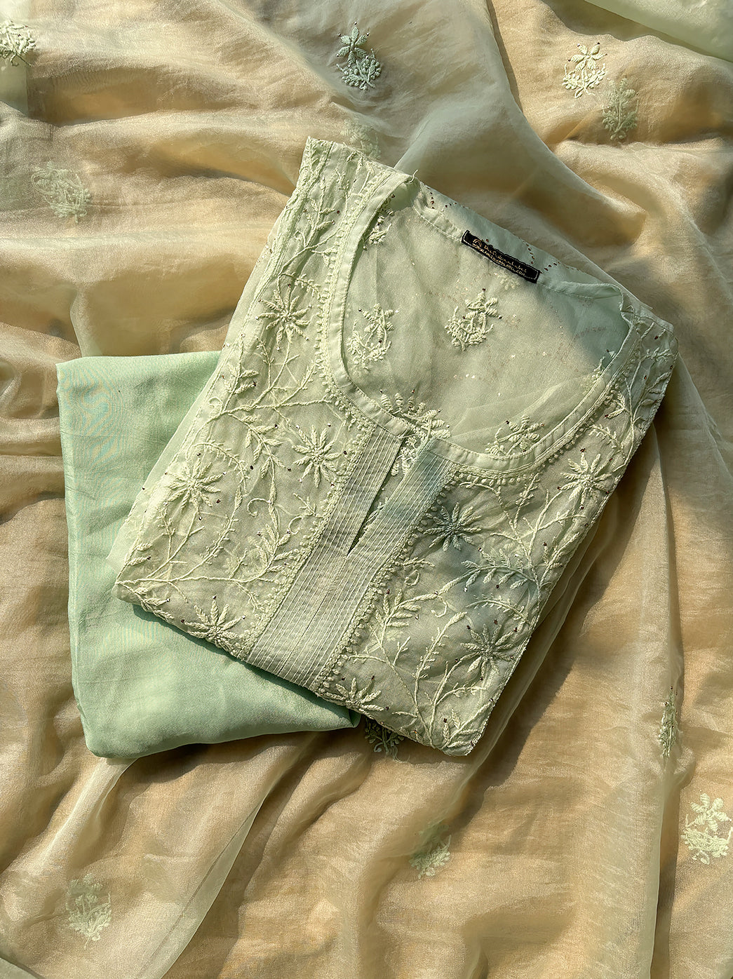 “Semi-stitched organza chikankari kurta set with dupatta featuring traditional Lucknowi hand embroidery”