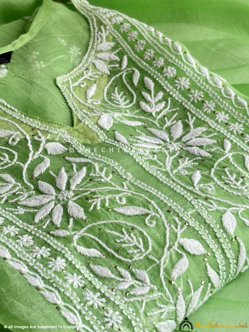 “Close-up of handcrafted chikankari embroidery on semi-stitched organza kurta piece with matching dupatta”
